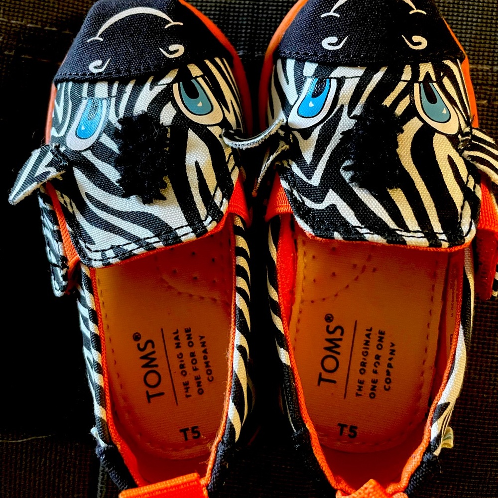 Toms tiny zebra slip on shoes